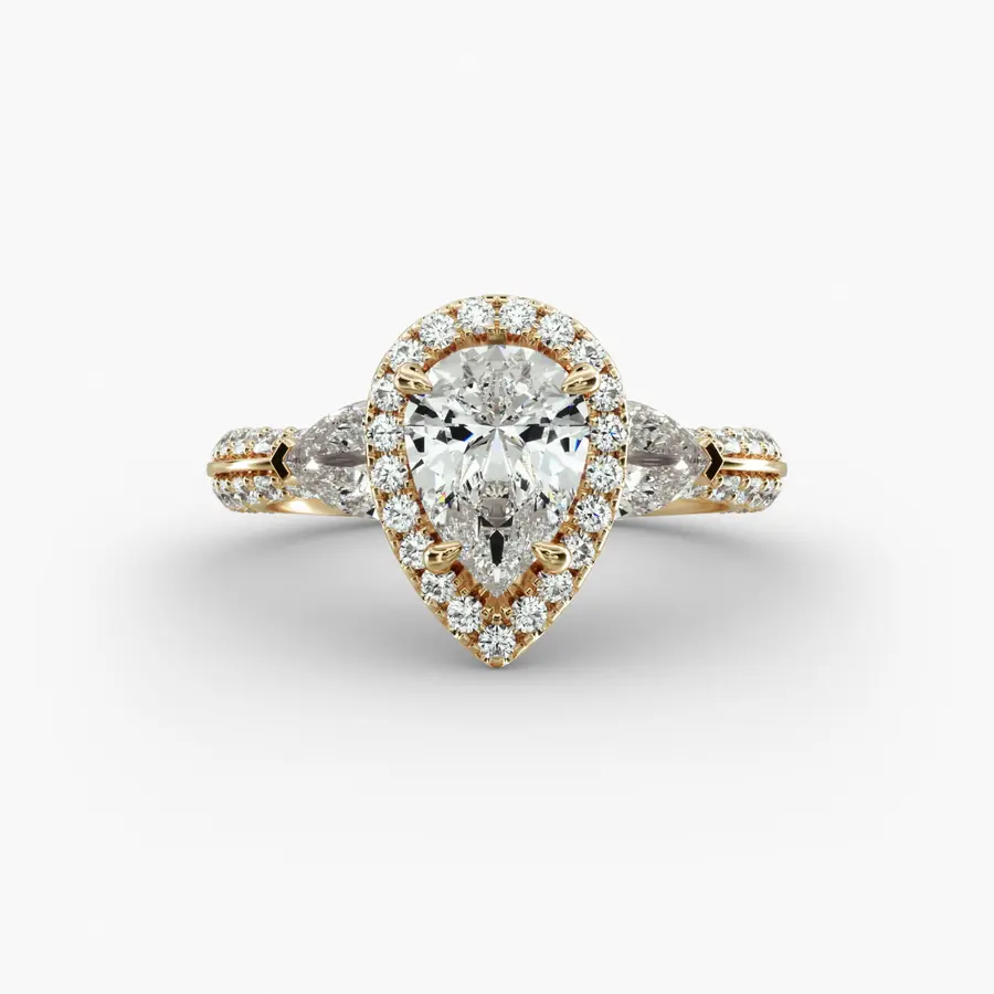 Knife Edge Pavé Engagement Ring with a pear diamond