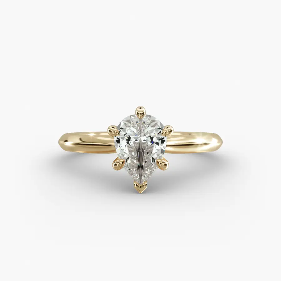 Knife Edge Engagement Ring with a pear diamond